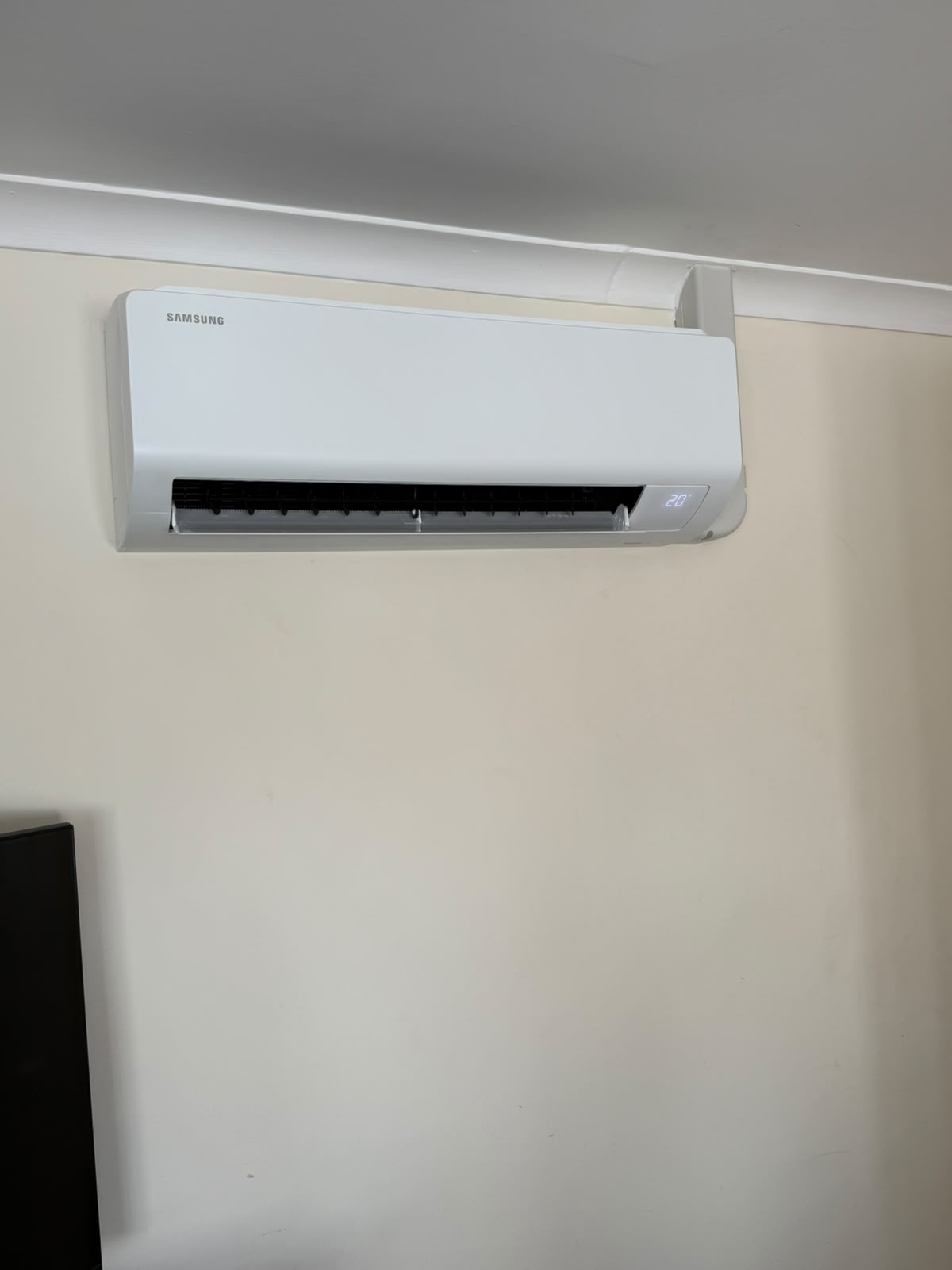 High-wall split air conditioning unit in domestic living area
